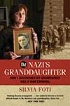 Photo of woman holding portrait of military officer father on book cover
